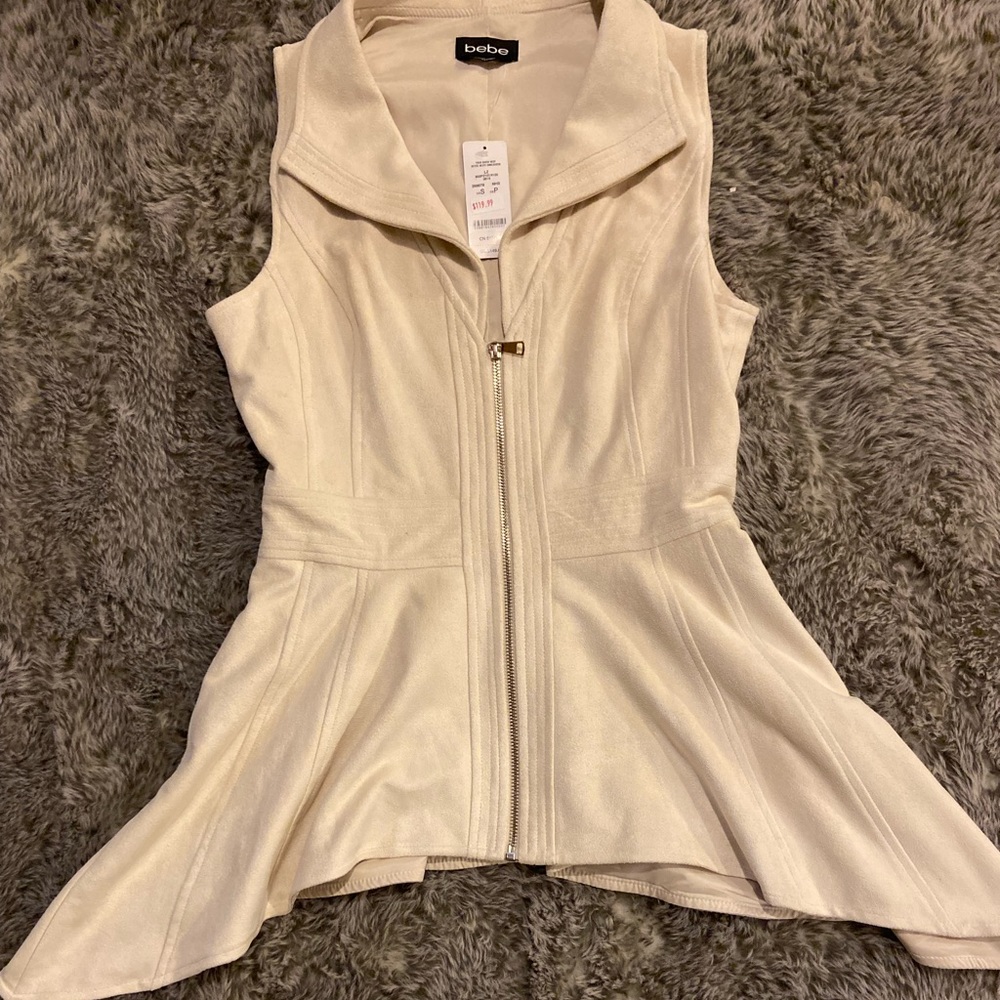 Size small BeBe jacket, never worn